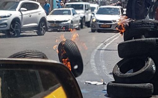 Безумие в Яффо: арабы бьют витрины и жгут полицейские авто
