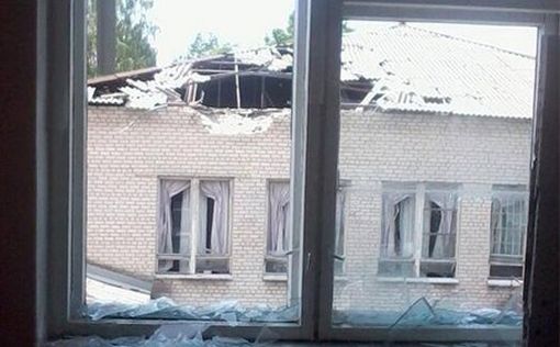 Террористы обстреляли в Славянске школу и жилые дома