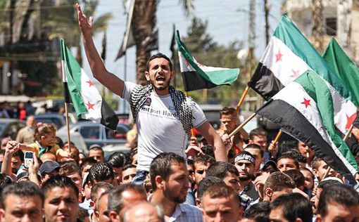 Сирийская оппозиция присоединится к мирным переговорам