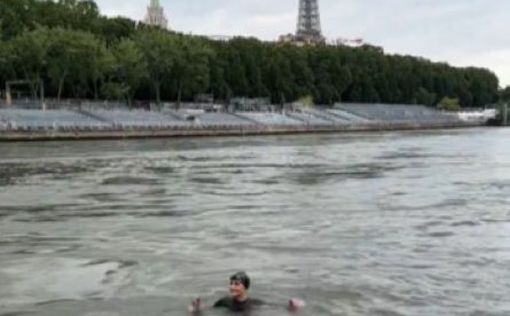 Заплыв по триатлону в Париже временно отменен из-за загрязнения Сены