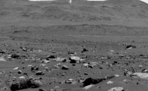 Аппарат NASA зафиксировал пылевой смерч в одном из кратеров Марса