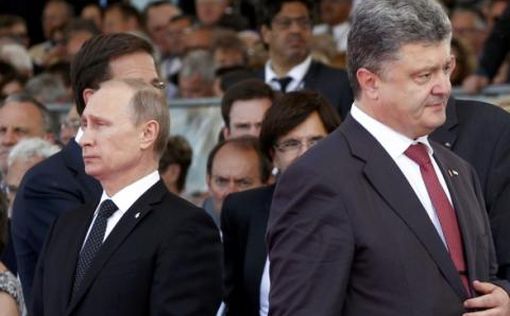 Порошенко и Путин обсудили первые сутки перемирия