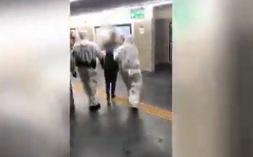 Видео: полиция ловит в поезде сбежавшего из изоляции