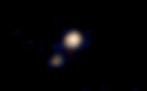 В сети появилось первое цветное фото Плутона