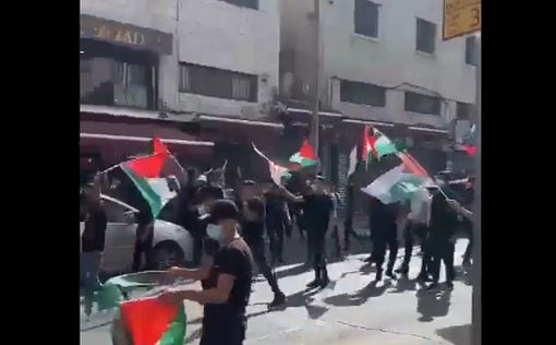 Палестинский парад флагов на улице Салах эд-Дин в Иерусалиме
