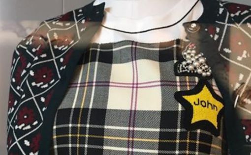 "Дочка" Prada продает одежду с желтыми звездами