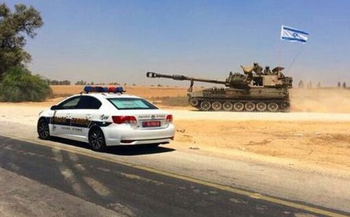 Дороги у границы с Газой забиты тягачами, увозящими танки